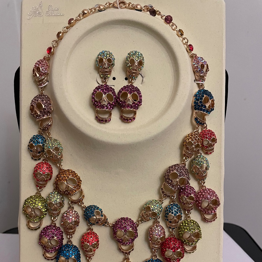 Perfect for Halloween Festivities Gold tone Skull necklace & earring set